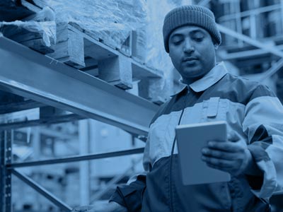 Man checking stock in warehouse